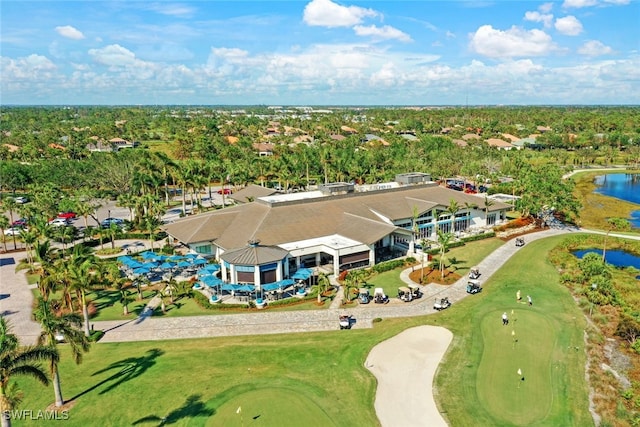 birds eye view of property featuring a water view and golf course view