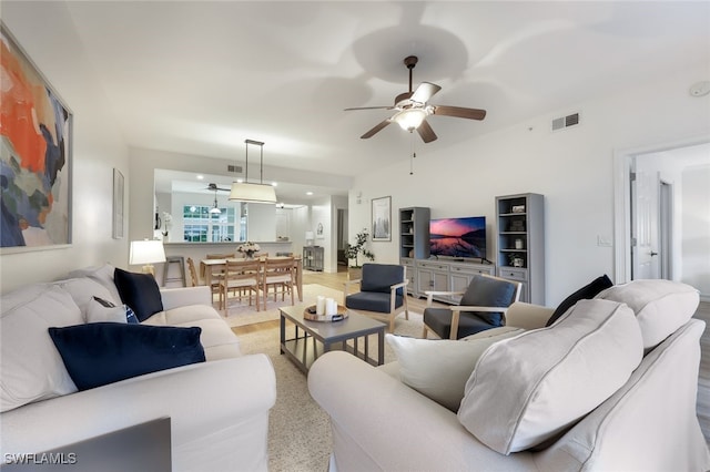 living room with ceiling fan