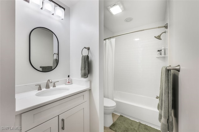 bathroom with vanity, toilet, and shower / bath combo with shower curtain