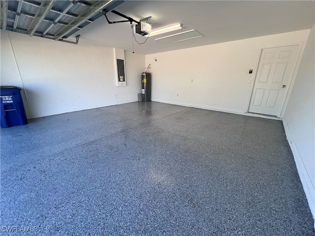 garage featuring electric panel, a garage door opener, and water heater