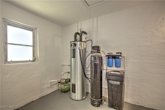 utility room with electric water heater