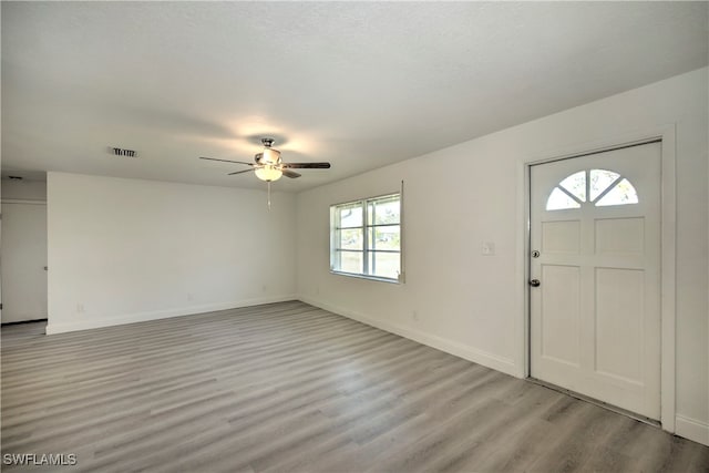 entryway featuring ceiling fan and light hardwood / wood-style floors