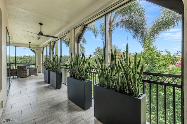 view of patio featuring outdoor lounge area and ceiling fan