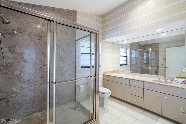 bathroom featuring walk in shower, tile patterned floors, vanity, and toilet