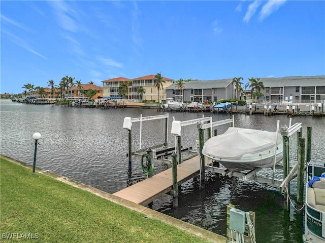 dock area featuring a water view