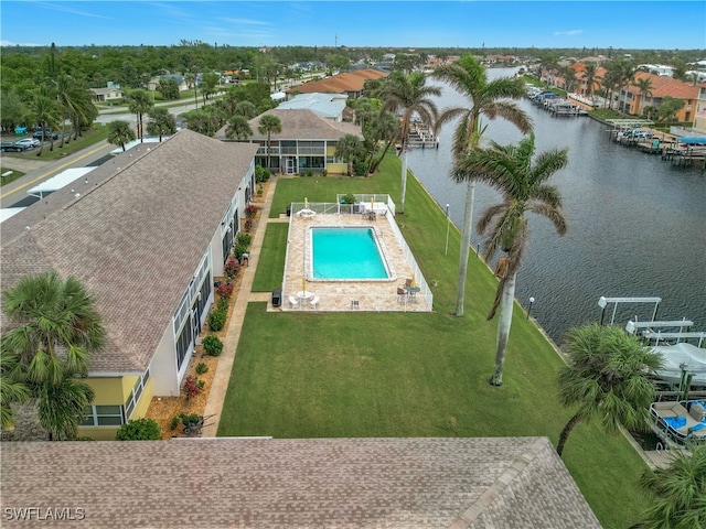 birds eye view of property featuring a water view