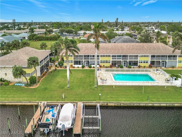 view of pool featuring a water view