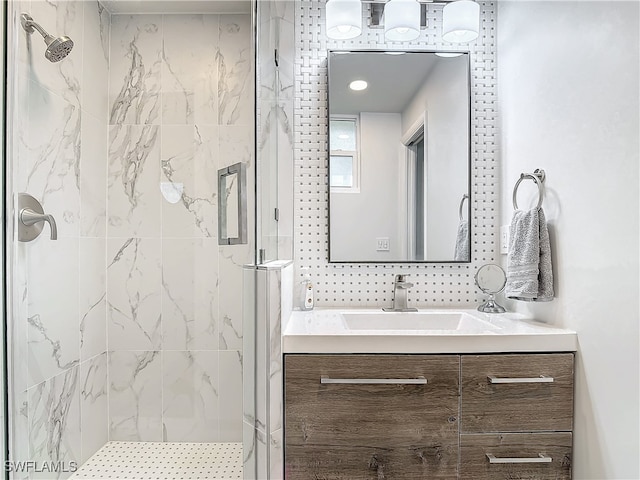 bathroom featuring vanity and walk in shower