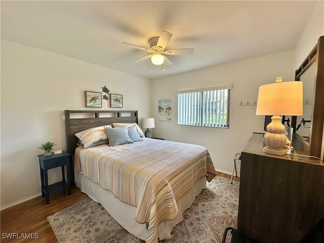 bedroom featuring ceiling fan and wood-type flooring