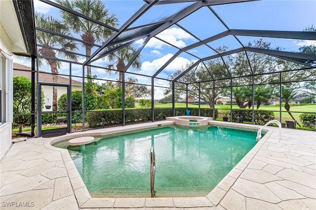 view of swimming pool with a lanai, an in ground hot tub, and a patio