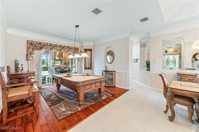 game room featuring ornamental molding, light wood-type flooring, and pool table