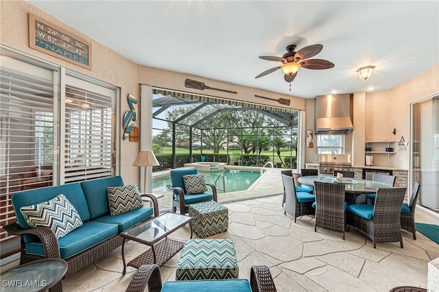 view of patio / terrace featuring outdoor lounge area, glass enclosure, a pool with hot tub, ceiling fan, and a grill