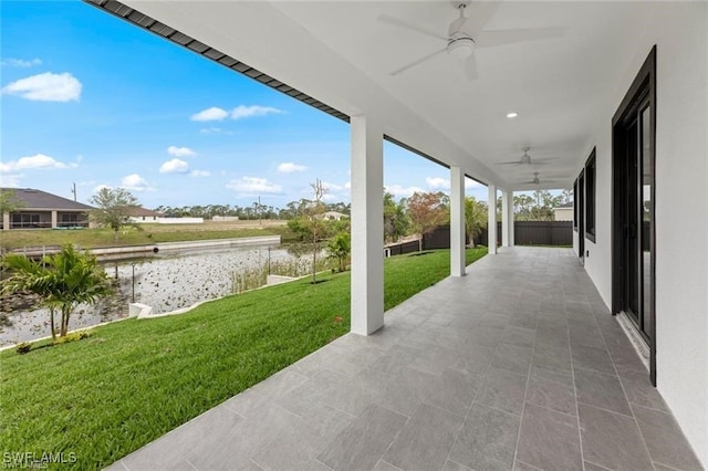 view of patio / terrace featuring ceiling fan