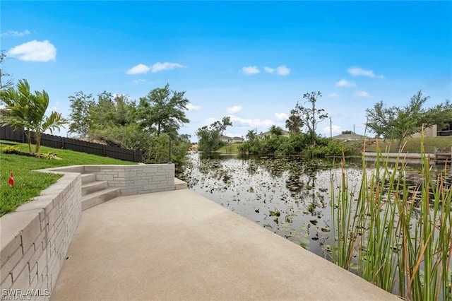 view of patio featuring a water view