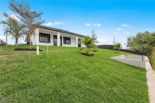 view of front of house with a front yard