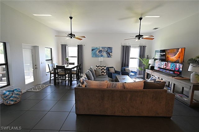 living room featuring dark tile patterned flooring