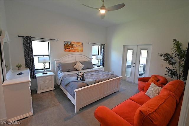 carpeted bedroom with access to exterior, ceiling fan, and french doors