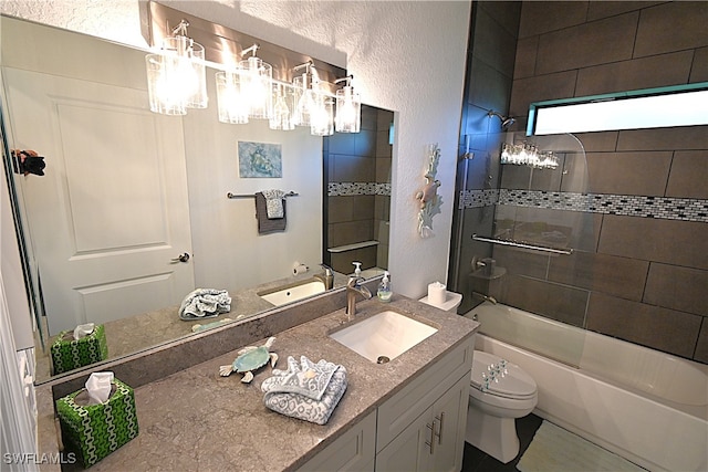 full bathroom featuring toilet, combined bath / shower with glass door, and vanity