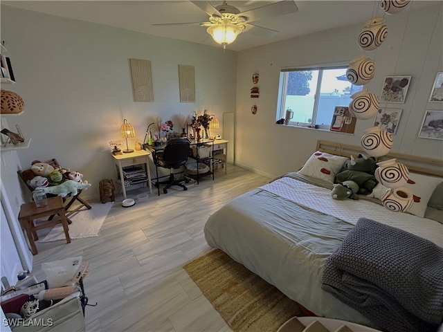 bedroom featuring ceiling fan and light hardwood / wood-style floors