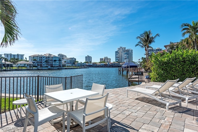 view of patio featuring a water view