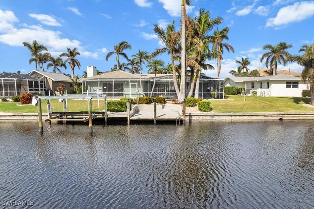 dock area with a water view and glass enclosure