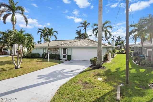 ranch-style home with a garage, concrete driveway, a front yard, and stucco siding