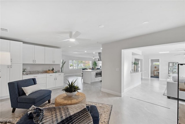 146 SW 51st St, Cape Coral, FL 33914 - interior space with baseboards, visible vents, ceiling fan, and finished concrete floors