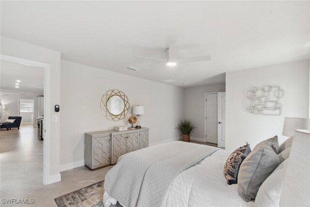 146 SW 51st St, Cape Coral, FL 33914 - bedroom featuring baseboards, ceiling fan, and finished concrete floors