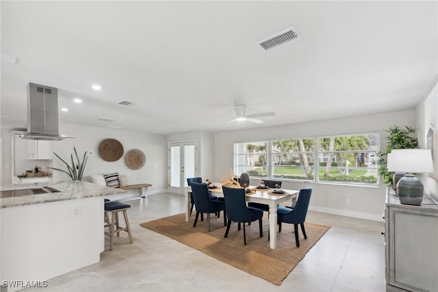 dining room featuring baseboards, visible vents, and recessed lighting