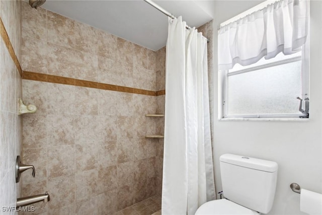 146 SW 51st St, Cape Coral, FL 33914 - bathroom with a tile shower and toilet
