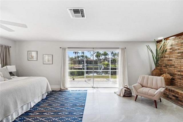 tiled bedroom featuring visible vents and access to exterior