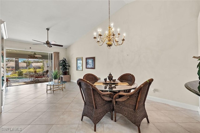 tiled dining room with ceiling fan with notable chandelier and high vaulted ceiling