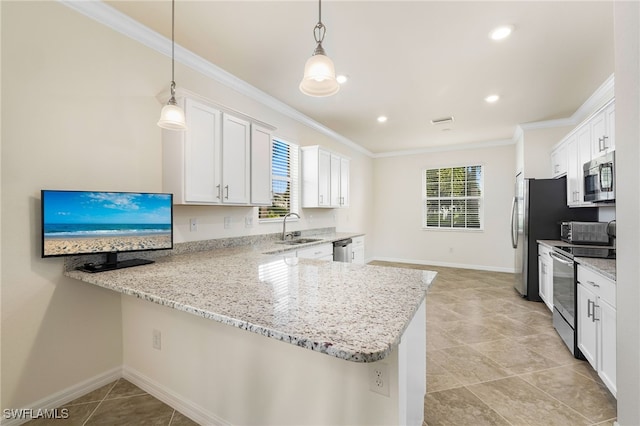 kitchen with white cabinets, stainless steel appliances, kitchen peninsula, and hanging light fixtures