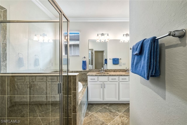 bathroom with ornamental molding, vanity, and shower with separate bathtub