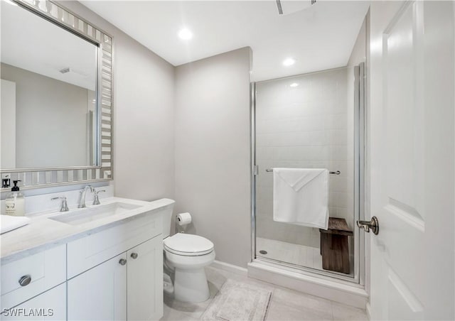 bathroom featuring vanity, an enclosed shower, tile patterned floors, and toilet