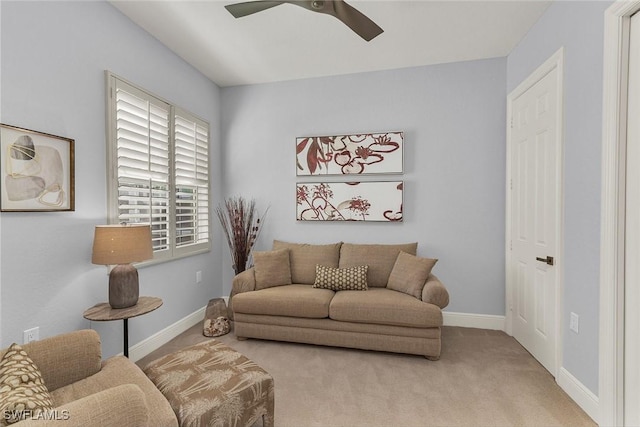 living room featuring ceiling fan and light carpet