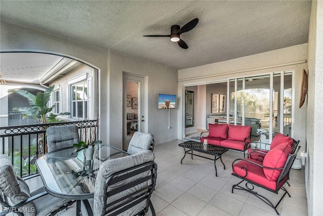 view of patio featuring ceiling fan and an outdoor hangout area