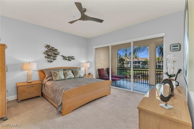 bedroom with ceiling fan, light carpet, and access to outside