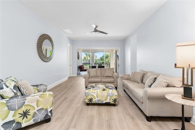 9219 Corfu Ct Unit 202, Naples, FL 34114 - living area with wood finished floors and ceiling fan