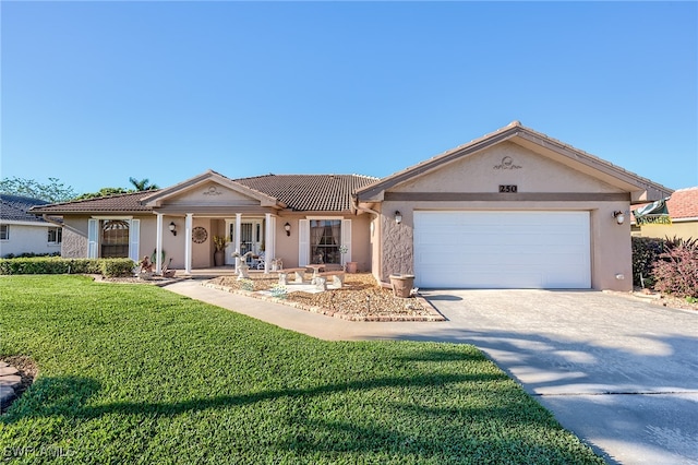 view of front facade featuring an attached garage, a front lawn, concrete driveway, and stucco siding