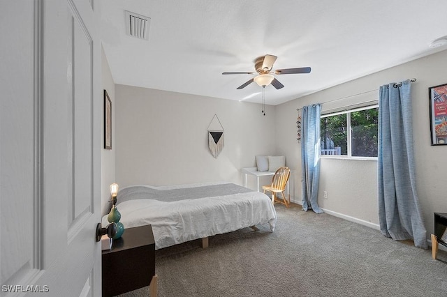 bedroom featuring a ceiling fan, carpet, visible vents, and baseboards