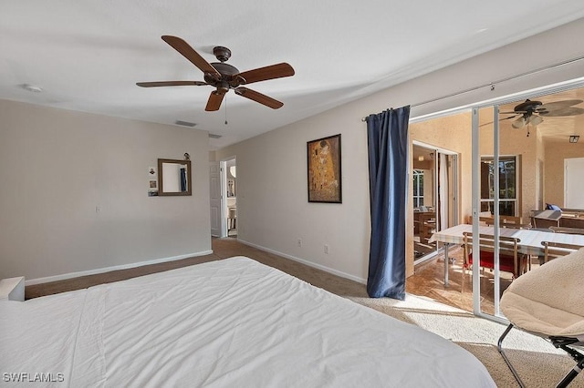 carpeted bedroom with access to exterior, ceiling fan, and baseboards