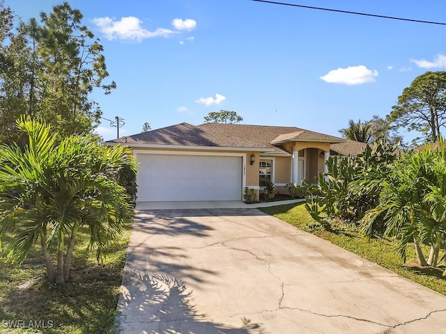 single story home featuring a garage