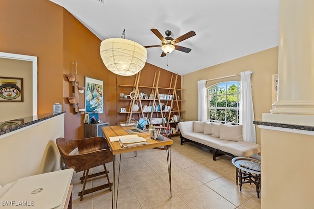 interior space with vaulted ceiling and ceiling fan