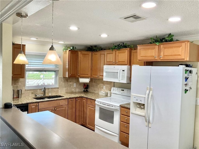 kitchen with sink, backsplash, hanging light fixtures, white appliances, and a textured ceiling