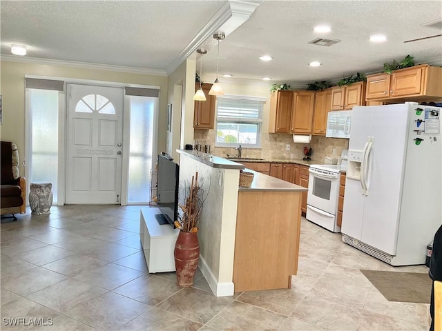 kitchen with pendant lighting, sink, decorative backsplash, ornamental molding, and white appliances