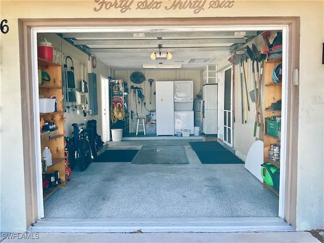 garage featuring electric water heater