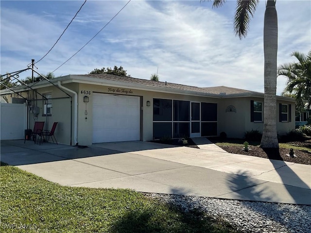 single story home with a garage