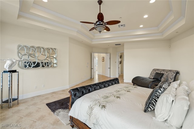 tiled bedroom with ceiling fan, crown molding, and a tray ceiling