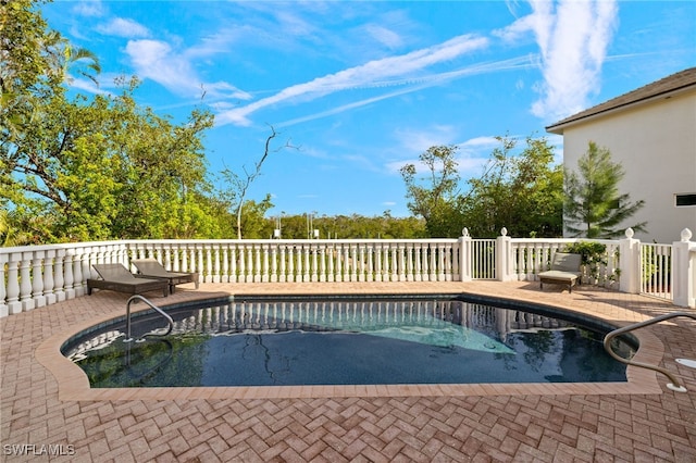 view of pool with a patio area